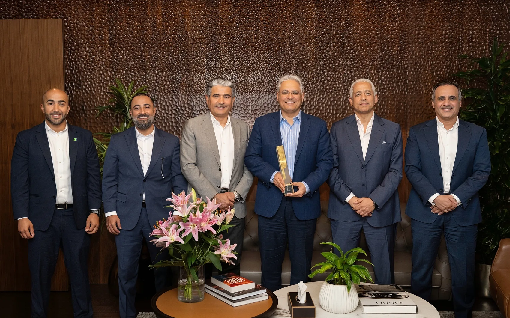Group photograph from the meeting between Aramco Downstream and the GDA